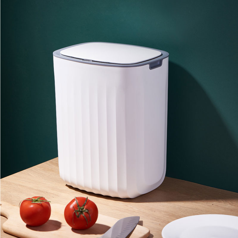 white plastic garbage can with lid